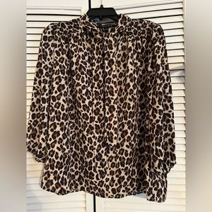 Delicate and sheer cheetah print tie front blouse size L